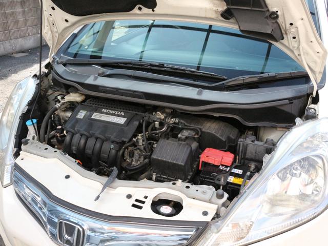 フィットハイブリッド ナビプレミアムセレクション　スカイルーフ・シートヒーター・Ｂｌｕｅｔｏｏｔｈ接続・バックカメラ・クルーズコントロール・コンフォートビューＰＫＧ・ＨＤＤナビ・ワンセグ・ＣＤ／ＤＶＤ再生・ＥＴＣ・ＨＩＤヘッドライト・パドルシフト（23枚目）