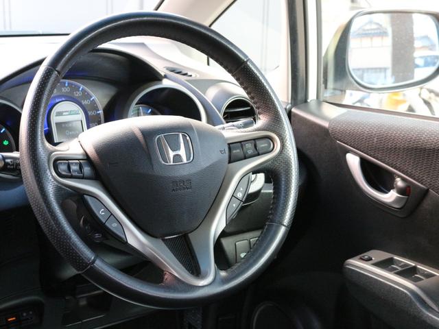 フィットハイブリッド ナビプレミアムセレクション　スカイルーフ・シートヒーター・Ｂｌｕｅｔｏｏｔｈ接続・バックカメラ・クルーズコントロール・コンフォートビューＰＫＧ・ＨＤＤナビ・ワンセグ・ＣＤ／ＤＶＤ再生・ＥＴＣ・ＨＩＤヘッドライト・パドルシフト（35枚目）