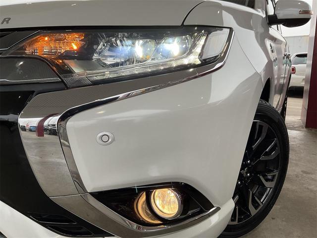 アウトランダーPHEV Gプレミアムパッケージ 前後ドラレコ 後席フリップダウンモニター ロックフォード 黒革シート eアシスト 全方位カメラ Bluetooth フルセグジTV LEDヘッド レーダークルーズ 誤発進抑制 LKA シートヒーター(62枚目)