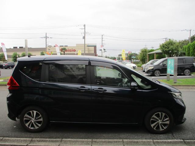 フリード Ｇ・ホンダセンシング　バックカメラ　ＥＴＣ　純正ナビ　衝突被害軽減ブレーキ　両側電動スライドドア　３列シート　ベンチシート　シートヒーター　ドライブレコーダー　後席モニター（14枚目）