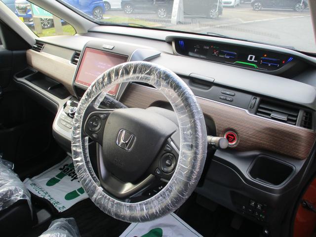 フリードハイブリッド ハイブリッド・クロスターホンダセンシング バックカメラ ETC シートヒーター 3列シート 両側電動スライドドア 前後ドライブレコーダー 衝突被害軽減ブレーキ(3枚目)