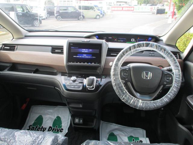 フリードハイブリッド ハイブリッド・クロスターホンダセンシング バックカメラ ETC シートヒーター 3列シート 両側電動スライドドア 前後ドライブレコーダー 衝突被害軽減ブレーキ(5枚目)