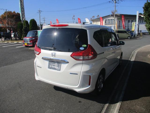 フリードハイブリッド ハイブリッド・Ｇホンダセンシング　バックカメラ　ＥＴＣ　衝突被害軽減ブレーキ　３列シート　両側電動スライドドア　純正ナビ　盗難防止装置　前後ドライブレコーダー（2枚目）