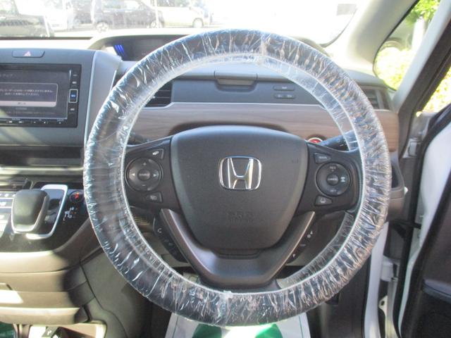 フリードハイブリッド ハイブリッド・Ｇホンダセンシング　バックカメラ　ＥＴＣ　衝突被害軽減ブレーキ　３列シート　両側電動スライドドア　純正ナビ　盗難防止装置　前後ドライブレコーダー（6枚目）