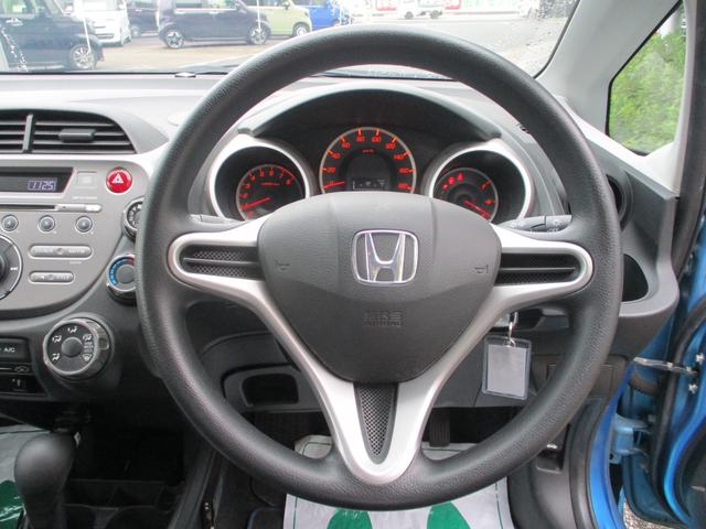 フィット Ｇ　オートライト　キーレスエントリー　ＥＴＣ　ＣＤチューナー　電動格納式ドアミラー　プライバシーガラス（6枚目）