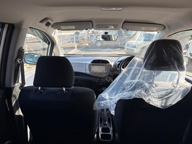 フィット G 純正ナビ バックカメラ オートライト 電動格納式ドアミラー キーレスエントリー 取扱説明書 メンテナンスノート ステアリングオーディオコントロールスイッチ(22枚目)