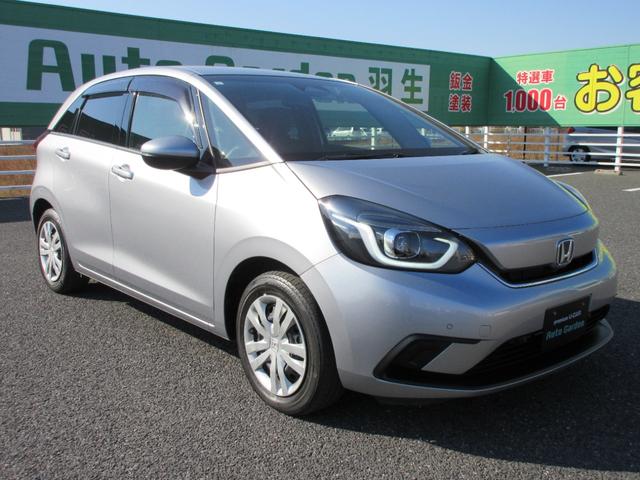 フィット ｅ：ＨＥＶホーム　【修復歴無し】純正９インチＳＤナビ・フルセグＴＶ　バックカメラ　ＥＴＣ　純正前後ドライブレコーダー　ホンダセンシング　ＡＡＣ　レーダークルーズコントロール　ＬＥＤヘッドライト　前後クリアランスソナー（7枚目）