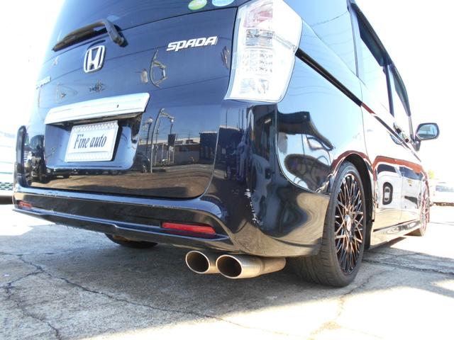 ステップワゴンスパーダ Z TEIN車高調キット 社外18インチアルミ 社外マフラー インターHDDナビ フリップダウンモニター バックカメラ 両側パワースライドドア ETC HIDヘッドライト スマートキー パドルシフト(3枚目)