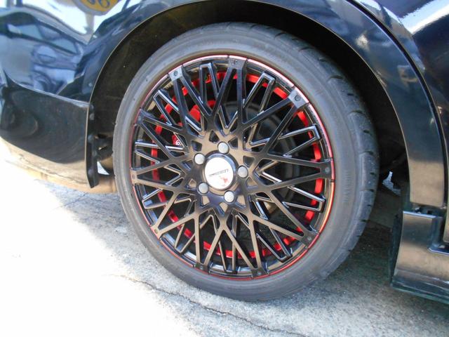 ステップワゴンスパーダ Z TEIN車高調キット 社外18インチアルミ 社外マフラー インターHDDナビ フリップダウンモニター バックカメラ 両側パワースライドドア ETC HIDヘッドライト スマートキー パドルシフト(4枚目)