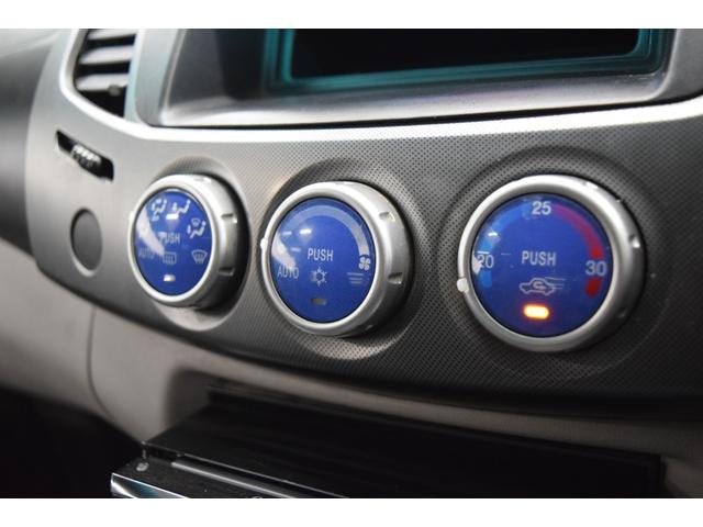 トライトン ベースグレード Bluetooth フルセグナビ バックカメラ キーレス MTタイヤ 4WD ヒッチメンバー オートエアコン 社外アルミホイール(26枚目)