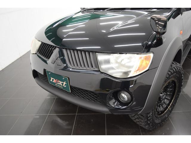 トライトン ベースグレード Bluetooth フルセグナビ バックカメラ キーレス MTタイヤ 4WD ヒッチメンバー オートエアコン 社外アルミホイール(31枚目)