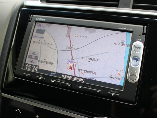 フィット １３Ｇ・Ｆパッケージ　雹被害車　ワンオーナー　あんしんパッケージ　衝突軽減ブレーキ　純正ナビ　ワンセグＴＶ　バックカメラ　ＥＴＣ　アイドリングストップ　ヘッドライトレベライザー　ウインカーミラー　オートリトラミラー（4枚目）