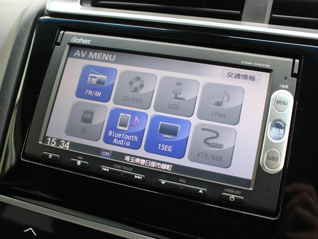 フィット １３Ｇ・Ｆパッケージ　雹被害車　ワンオーナー　あんしんパッケージ　衝突軽減ブレーキ　純正ナビ　ワンセグＴＶ　バックカメラ　ＥＴＣ　アイドリングストップ　ヘッドライトレベライザー　ウインカーミラー　オートリトラミラー（5枚目）