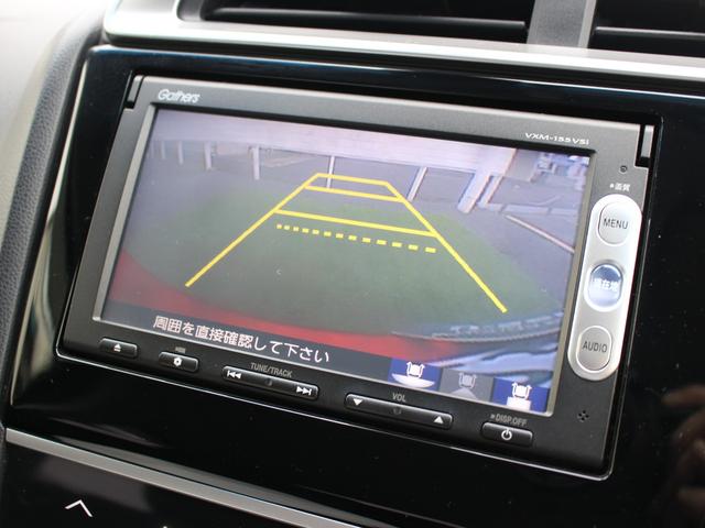 フィット １３Ｇ・Ｆパッケージ　雹被害車　ワンオーナー　あんしんパッケージ　衝突軽減ブレーキ　純正ナビ　ワンセグＴＶ　バックカメラ　ＥＴＣ　アイドリングストップ　ヘッドライトレベライザー　ウインカーミラー　オートリトラミラー（6枚目）