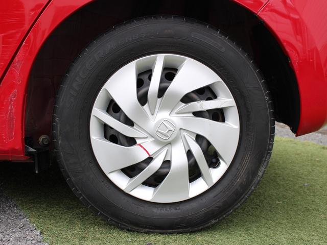 フィット １３Ｇ・Ｆパッケージ　雹被害車　ワンオーナー　あんしんパッケージ　衝突軽減ブレーキ　純正ナビ　ワンセグＴＶ　バックカメラ　ＥＴＣ　アイドリングストップ　ヘッドライトレベライザー　ウインカーミラー　オートリトラミラー（22枚目）