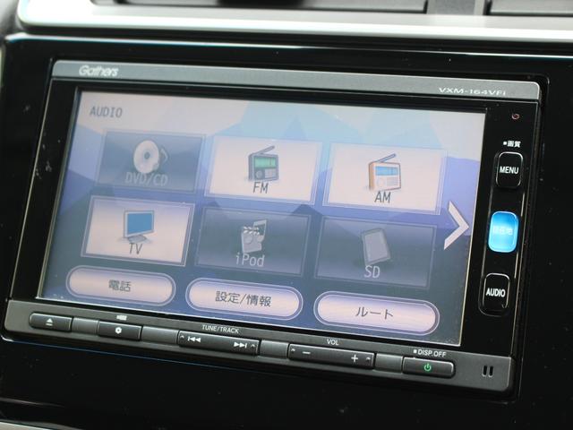 フィットハイブリッド Ｆパッケージ　ワンオーナー　純ナビ　フルセグＴＶ　Ｂｌｕｅｔｏｏｔｈ　バックカメラ　オートリトラミラー　横滑り防止　スマートキー　ビルトインＥＴＣ　ステアリングリモコン　地デジＴＶ　ＡＵＸ接続　ｂｌｕｅｔｏｏｔｈ（7枚目）