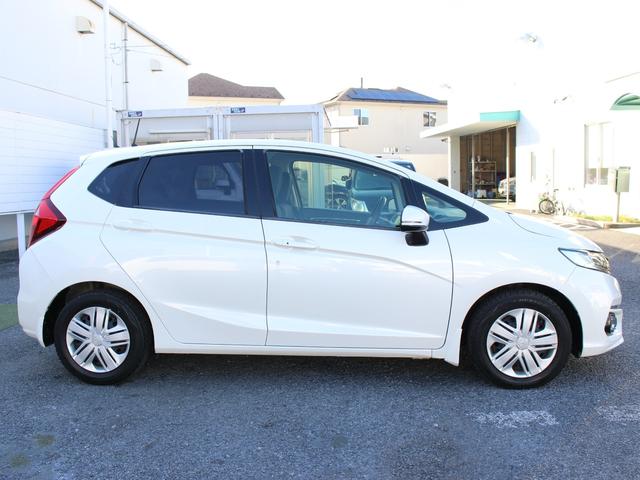 フィット １３Ｇ・Ｌホンダセンシング　ワンオーナー　純正ナビ　前ドラレコ　Ｂカメラ　ＥＴＣ　地デジフルセグＴＶ　１オーナー車　ＤＶＤ再生可　ナビ＆ＴＶ　サイドカーテンエアバック　リアカメラ　エアバック　パワーウインドウ　記録簿　ＶＳＡ（6枚目）