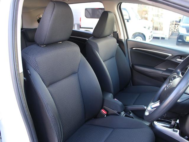 フィット １３Ｇ・Ｌホンダセンシング　ワンオーナー　純正ナビ　前ドラレコ　Ｂカメラ　ＥＴＣ　地デジフルセグＴＶ　１オーナー車　ＤＶＤ再生可　ナビ＆ＴＶ　サイドカーテンエアバック　リアカメラ　エアバック　パワーウインドウ　記録簿　ＶＳＡ（13枚目）