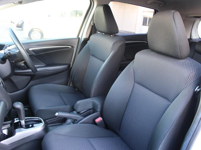 フィット １３Ｇ・Ｌホンダセンシング　ワンオーナー　純正ナビ　前ドラレコ　Ｂカメラ　ＥＴＣ　地デジフルセグＴＶ　１オーナー車　ＤＶＤ再生可　ナビ＆ＴＶ　サイドカーテンエアバック　リアカメラ　エアバック　パワーウインドウ　記録簿　ＶＳＡ（14枚目）
