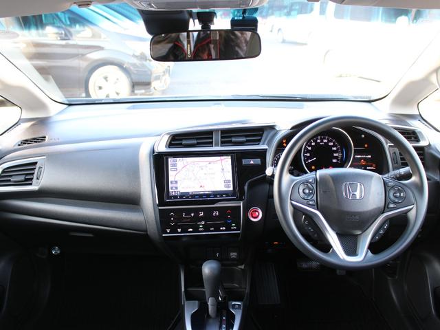 フィット １３Ｇ・Ｌホンダセンシング　ワンオーナー　純正ナビ　前ドラレコ　Ｂカメラ　ＥＴＣ　地デジフルセグＴＶ　１オーナー車　ＤＶＤ再生可　ナビ＆ＴＶ　サイドカーテンエアバック　リアカメラ　エアバック　パワーウインドウ　記録簿　ＶＳＡ（16枚目）