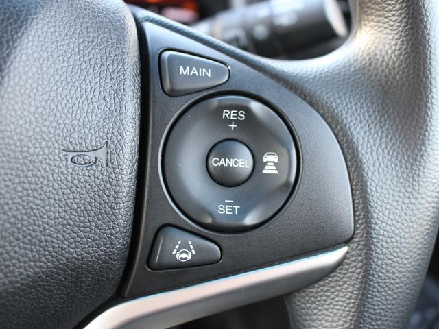 フィット １３Ｇ・Ｌホンダセンシング　ワンオーナー　純正ナビ　前ドラレコ　Ｂカメラ　ＥＴＣ　地デジフルセグＴＶ　１オーナー車　ＤＶＤ再生可　ナビ＆ＴＶ　サイドカーテンエアバック　リアカメラ　エアバック　パワーウインドウ　記録簿　ＶＳＡ（18枚目）