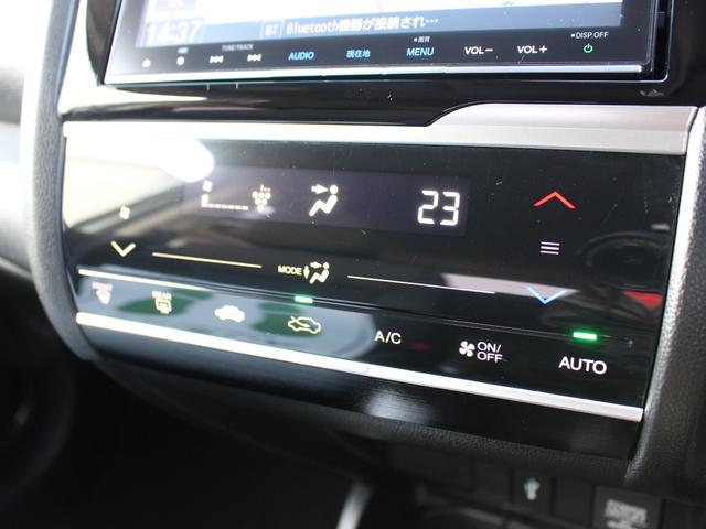 フィット １３Ｇ・Ｌホンダセンシング　ワンオーナー　純正ナビ　前ドラレコ　Ｂカメラ　ＥＴＣ　地デジフルセグＴＶ　１オーナー車　ＤＶＤ再生可　ナビ＆ＴＶ　サイドカーテンエアバック　リアカメラ　エアバック　パワーウインドウ　記録簿　ＶＳＡ（26枚目）
