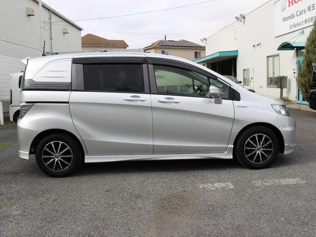 フリードスパイクハイブリッド ジャストセレクション　Ａｎｄｒｏｉｄディスプレイオーディオ　クルーズコントロール　ＥＴＣ　ＨＩＤヘッド　リモコンキー　左パワースライド　横滑り防止　社外アルミホイール　キーフリー　エアコン　両側スライド片側電動　ＡＢＳ（15枚目）