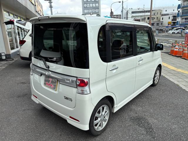 タント カスタムＸリミテッド　ワンオーナー　禁煙車　社外ＳＤナビ　フルセグ　スマートキー　片側電動スライドドア　ＨＩＤヘッドライト　フォグランプ　プライバシーガラス　純正１４インチアルミホイール　車両ナビ取扱説明書　スペアキー（2枚目）