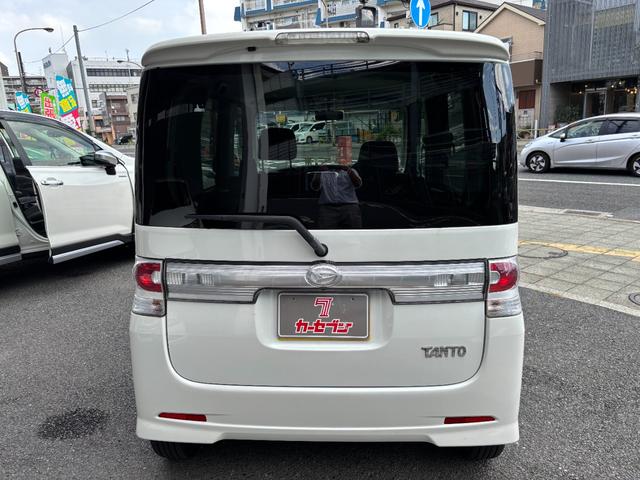 タント カスタムＸリミテッド　ワンオーナー　禁煙車　社外ＳＤナビ　フルセグ　スマートキー　片側電動スライドドア　ＨＩＤヘッドライト　フォグランプ　プライバシーガラス　純正１４インチアルミホイール　車両ナビ取扱説明書　スペアキー（7枚目）