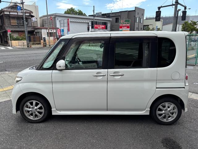 タント カスタムＸリミテッド　ワンオーナー　禁煙車　社外ＳＤナビ　フルセグ　スマートキー　片側電動スライドドア　ＨＩＤヘッドライト　フォグランプ　プライバシーガラス　純正１４インチアルミホイール　車両ナビ取扱説明書　スペアキー（9枚目）