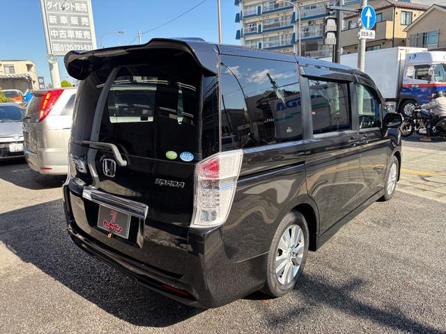 ステップワゴンスパーダ Ｓ　片側電動スライドドア　パドルシフト　ＨＩＤヘッドライト　革巻きステアリング　純正１６インチアルミ　ＥＴＣ　キーレス　車両ナビ取扱説明書（2枚目）