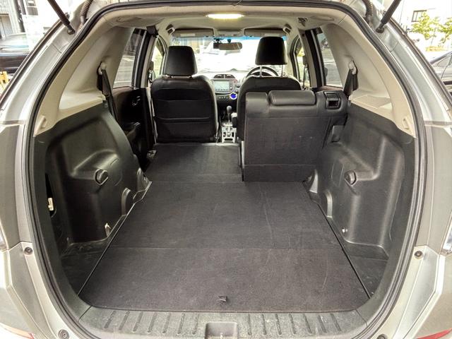 フィットシャトルハイブリッド ハイブリッド・スマートセレクション　助手席回転シート　ハーフレザー　スマートキー２個　Ｈ２５年からＲ７年ディーラー記録簿　純正メモリーナビ　バックカメラ　ＣＤ／ＤＶＤ再生可　ワンセグＴＶ　ＥＴＣ　ノーマルクルコン　ＨＩＤオートライト（24枚目）