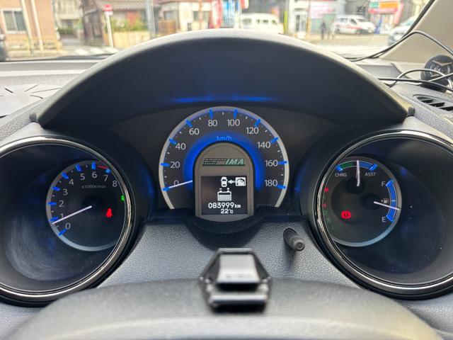 フィットシャトルハイブリッド ハイブリッド・スマートセレクション　助手席回転シート　ハーフレザー　スマートキー２個　Ｈ２５年からＲ７年ディーラー記録簿　純正メモリーナビ　バックカメラ　ＣＤ／ＤＶＤ再生可　ワンセグＴＶ　ＥＴＣ　ノーマルクルコン　ＨＩＤオートライト（28枚目）