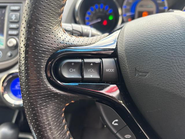 フィットシャトルハイブリッド ハイブリッド・スマートセレクション　助手席回転シート　ハーフレザー　スマートキー２個　Ｈ２５年からＲ７年ディーラー記録簿　純正メモリーナビ　バックカメラ　ＣＤ／ＤＶＤ再生可　ワンセグＴＶ　ＥＴＣ　ノーマルクルコン　ＨＩＤオートライト（30枚目）