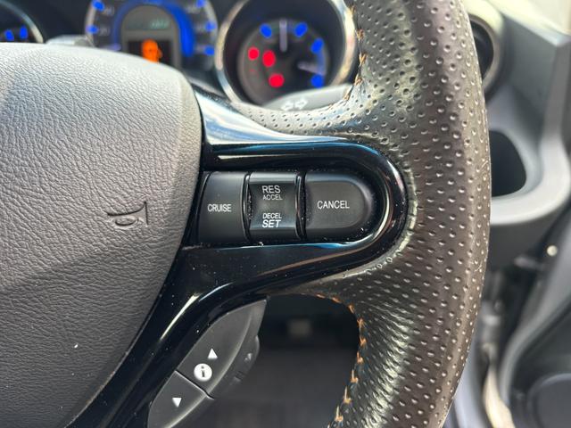 フィットシャトルハイブリッド ハイブリッド・スマートセレクション　助手席回転シート　ハーフレザー　スマートキー２個　Ｈ２５年からＲ７年ディーラー記録簿　純正メモリーナビ　バックカメラ　ＣＤ／ＤＶＤ再生可　ワンセグＴＶ　ＥＴＣ　ノーマルクルコン　ＨＩＤオートライト（31枚目）