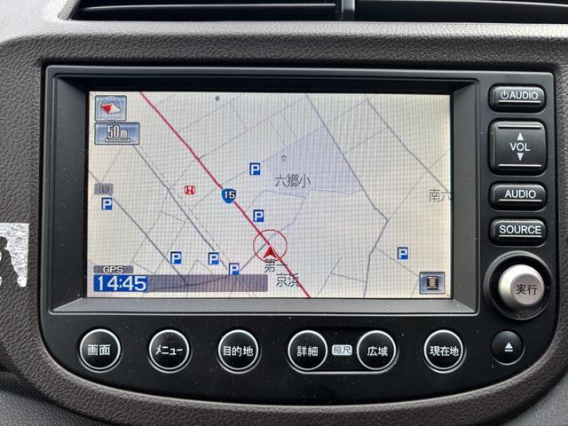 フィットシャトルハイブリッド ハイブリッド・スマートセレクション　助手席回転シート　ハーフレザー　スマートキー２個　Ｈ２５年からＲ７年ディーラー記録簿　純正メモリーナビ　バックカメラ　ＣＤ／ＤＶＤ再生可　ワンセグＴＶ　ＥＴＣ　ノーマルクルコン　ＨＩＤオートライト（35枚目）