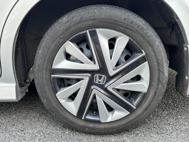 フィットシャトルハイブリッド ハイブリッド・スマートセレクション　助手席回転シート　ハーフレザー　スマートキー２個　Ｈ２５年からＲ７年ディーラー記録簿　純正メモリーナビ　バックカメラ　ＣＤ／ＤＶＤ再生可　ワンセグＴＶ　ＥＴＣ　ノーマルクルコン　ＨＩＤオートライト（46枚目）