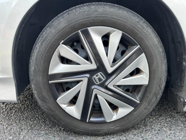 フィットシャトルハイブリッド ハイブリッド・スマートセレクション　助手席回転シート　ハーフレザー　スマートキー２個　Ｈ２５年からＲ７年ディーラー記録簿　純正メモリーナビ　バックカメラ　ＣＤ／ＤＶＤ再生可　ワンセグＴＶ　ＥＴＣ　ノーマルクルコン　ＨＩＤオートライト（47枚目）