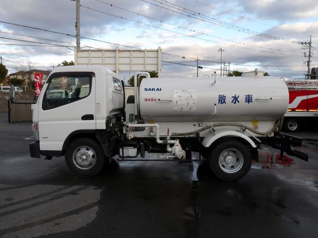 　散水車　４０００Ｌ　酒井重工業製　ＳＴ４ＭＢ－１　前方圧力散水　後方重力散水　吸水作動可　給水ホース付　ワイド　セミロング　１７５馬力(5枚目)