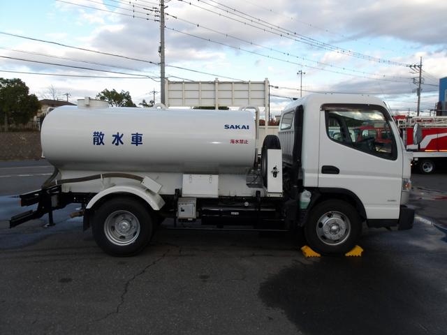 　散水車　４０００Ｌ　酒井重工業製　ＳＴ４ＭＢ－１　前方圧力散水　後方重力散水　吸水作動可　給水ホース付　ワイド　セミロング　１７５馬力(6枚目)