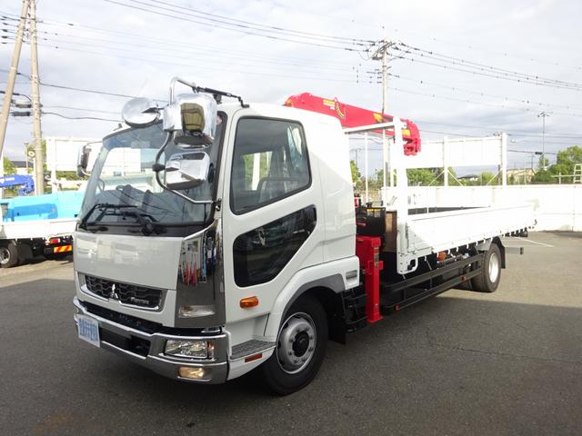 ファイター 　増トン　４段クレーン付　古河ユニック製　警報仕様　ラジコン付　７．７トン積載　ワイド幅　ベッド付　木製あおり３方開　超ワイド角足アウトリガ　２４０馬力（3枚目）