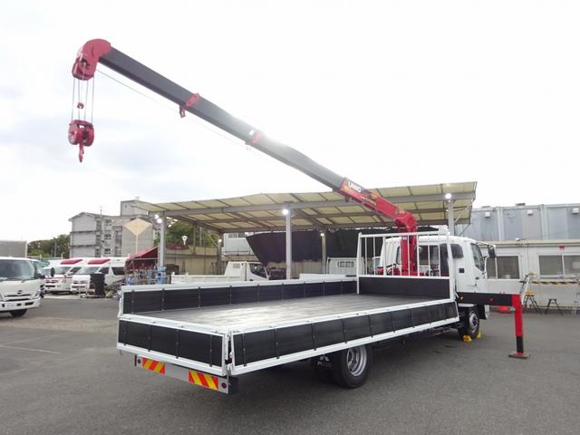 ファイター 　増トン　４段クレーン付　古河ユニック製　警報仕様　ラジコン付　７．７トン積載　ワイド幅　ベッド付　木製あおり３方開　超ワイド角足アウトリガ　２４０馬力（4枚目）