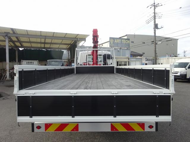 ファイター 　増トン　４段クレーン付　古河ユニック製　警報仕様　ラジコン付　７．７トン積載　ワイド幅　ベッド付　木製あおり３方開　超ワイド角足アウトリガ　２４０馬力（7枚目）
