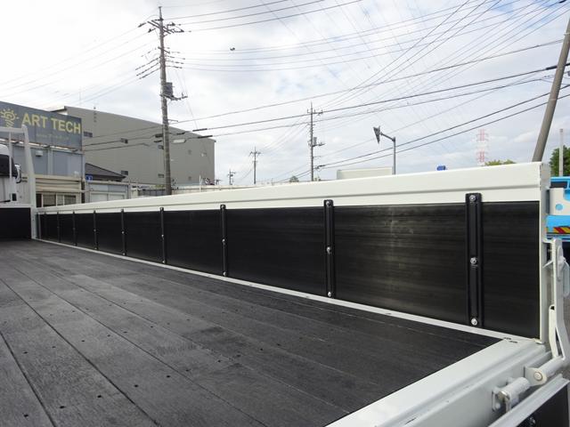 ファイター 　増トン　４段クレーン付　古河ユニック製　警報仕様　ラジコン付　７．７トン積載　ワイド幅　ベッド付　木製あおり３方開　超ワイド角足アウトリガ　２４０馬力（35枚目）