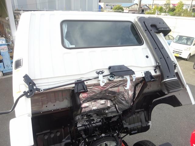 ファイター 　増トン　４段クレーン付　古河ユニック製　警報仕様　ラジコン付　７．７トン積載　ワイド幅　ベッド付　木製あおり３方開　超ワイド角足アウトリガ　２４０馬力（43枚目）