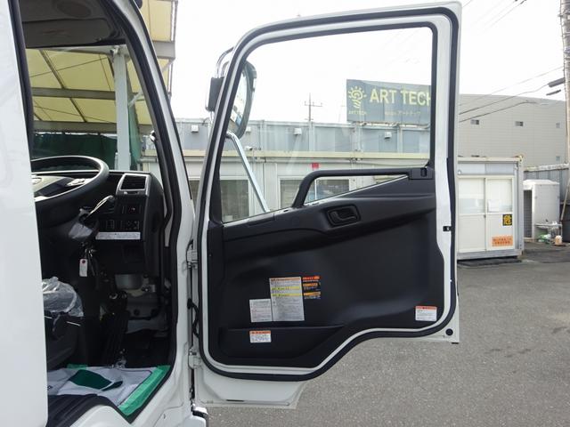 ファイター 　増トン　４段クレーン付　古河ユニック製　警報仕様　ラジコン付　７．７トン積載　ワイド幅　ベッド付　木製あおり３方開　超ワイド角足アウトリガ　２４０馬力（65枚目）