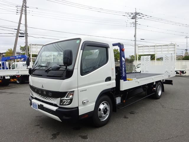 キャンター 車両運搬車 車載専用車 セミAT デュオニック 極東開発工業 フラトップZero タイヤ固縛 ウインチ 3t積載 ワイド 荷台長5.7m 150馬力(3枚目)