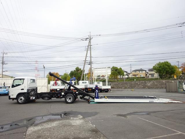 キャンター 車両運搬車 車載専用車 セミAT デュオニック 極東開発工業 フラトップZero タイヤ固縛 ウインチ 3t積載 ワイド 荷台長5.7m 150馬力(5枚目)