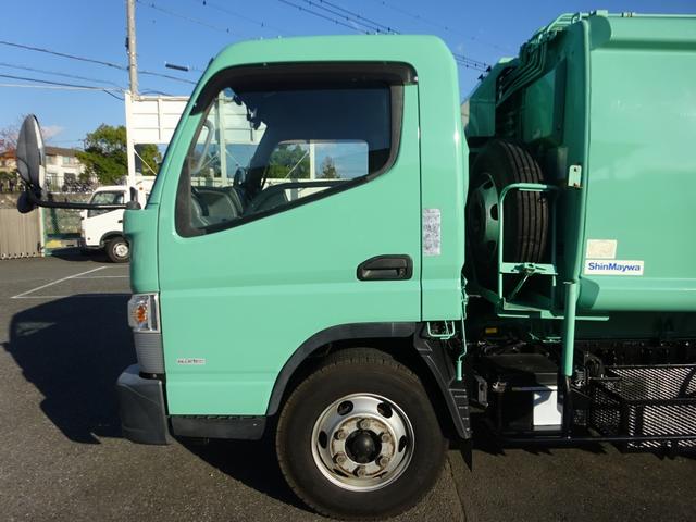 キャンター 　プレス式パッカー　６．０ｍ３　新明和工業製　３．１トン積載　連続積込　汚水タンク付　ワイド　セミロング　１５０馬力　リヤシャッター式扉（46枚目）