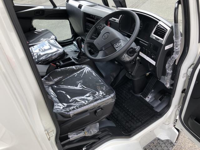 ファイター 　増トン　土砂ダンプ　新明和工業製　８トン積載　３．４ｍボディ　４．０ｍ３　角底　強化一方開　標準幅　ベッド付　リーフサス　油圧式自重計　２４０馬力（8枚目）